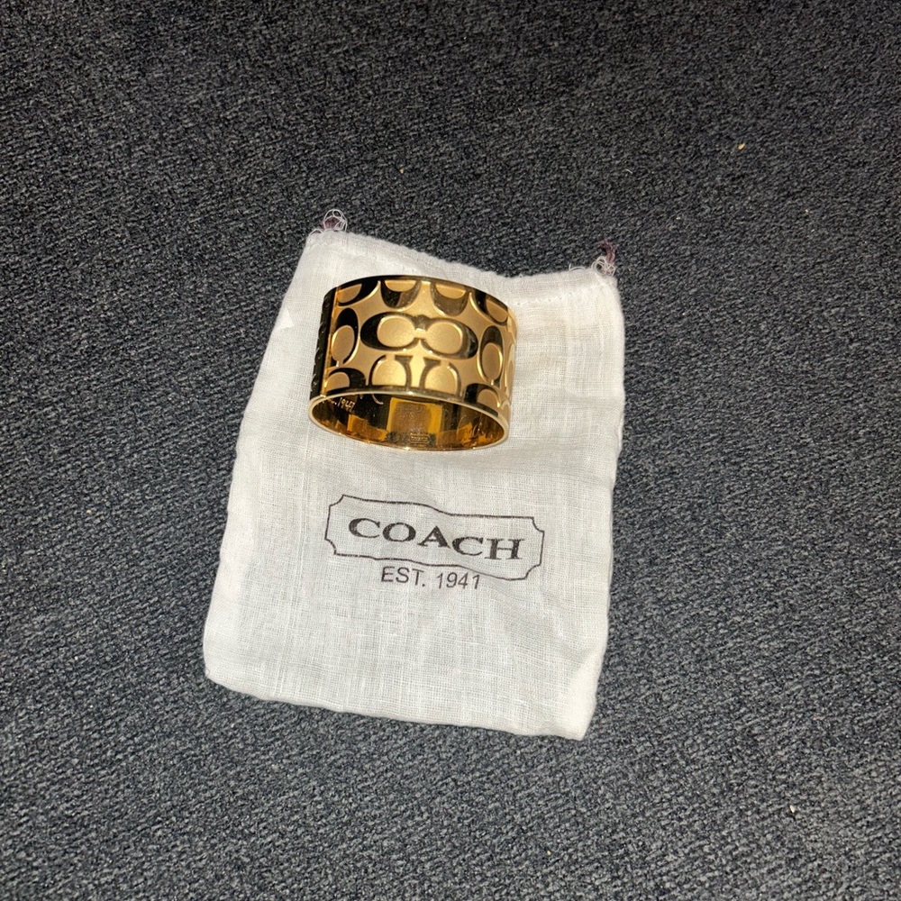 COACH Gold-Tone Signature Cuff Bracelet
